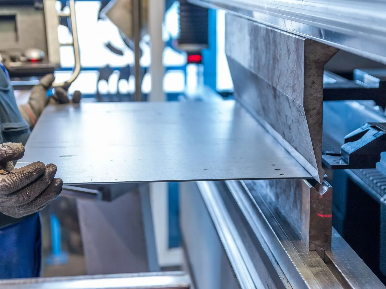 CNC press brake bending a steel sheet